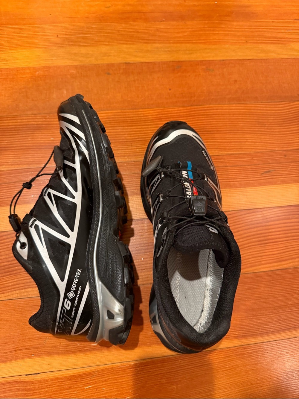 Salomon Black Athletic Trail Shoes with White Accents